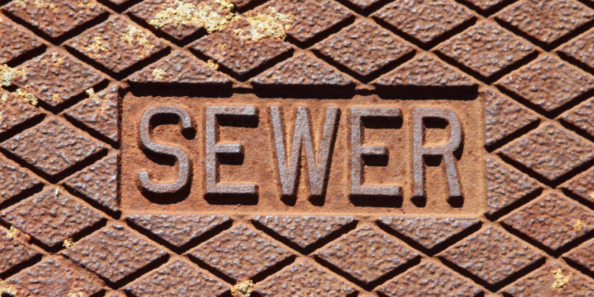 a sewer manhole cover representing the issues around wastewater in suburban Adelaide.